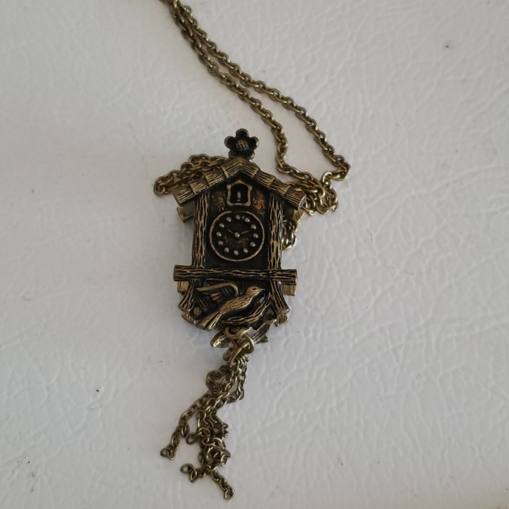 Long necklace fashion..cookoo  clock